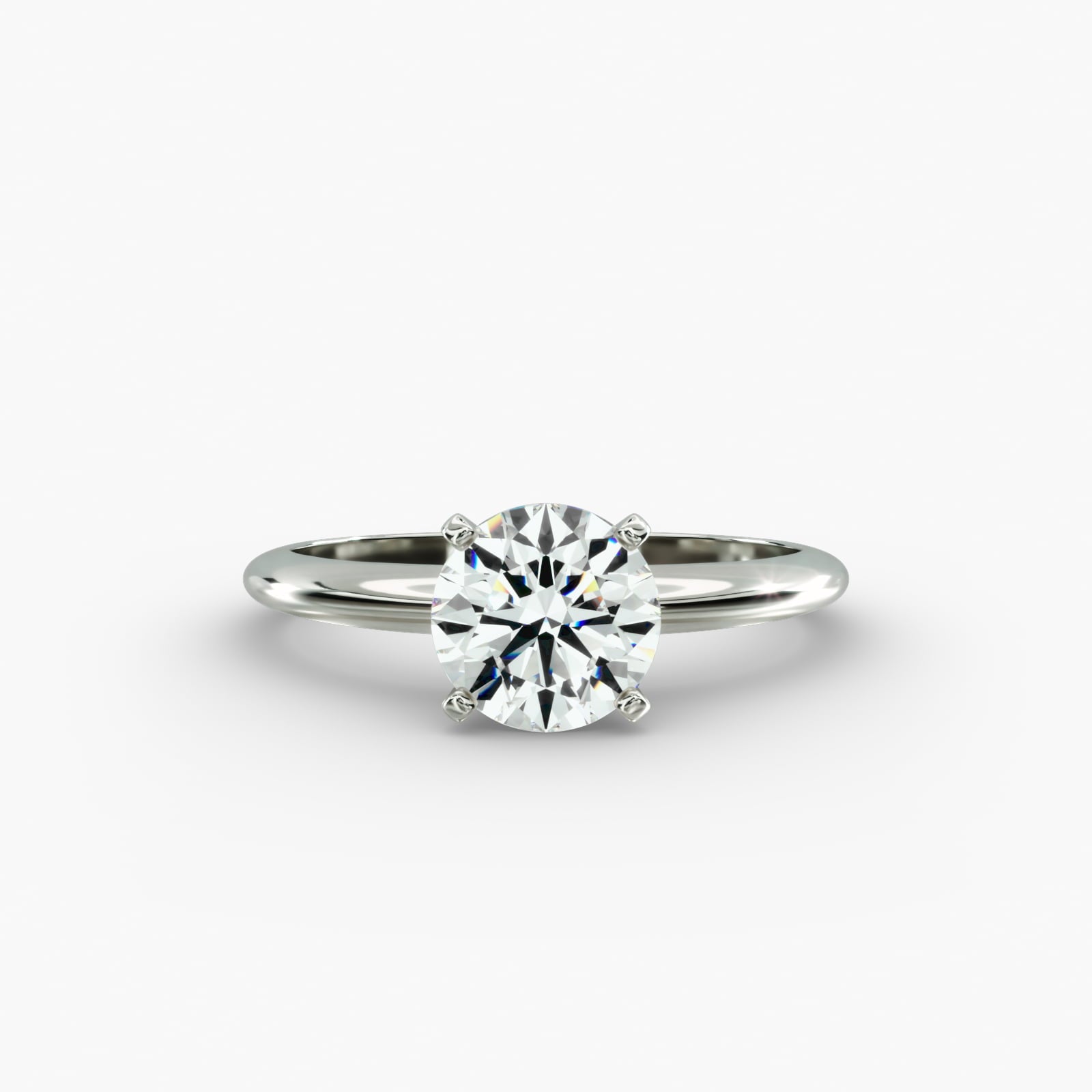 Classic Four Prong Solitaire Engagement Ring in Platinum